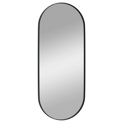 vidaXL Zidno ogledalo crno 25x60 cm ovalno