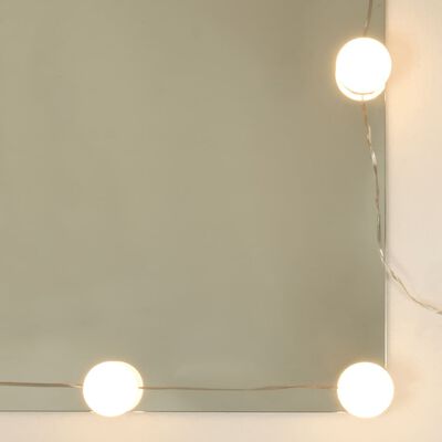 vidaXL Ormarić s ogledalom i LED svjetlima bijeli 76 x 15 x 55 cm